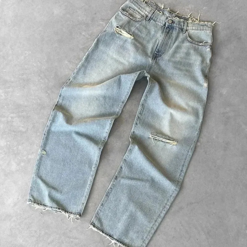 DISTRESSED FLARED JEANS