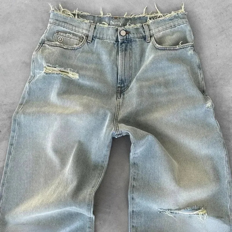 DISTRESSED FLARED JEANS